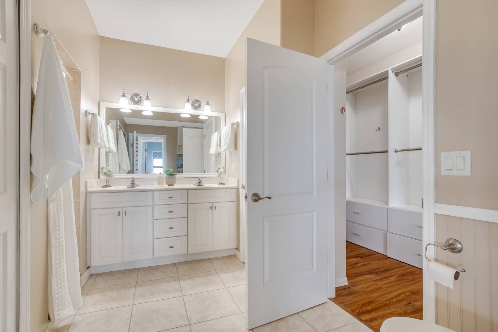 First-floor bath with dual sinks and shower