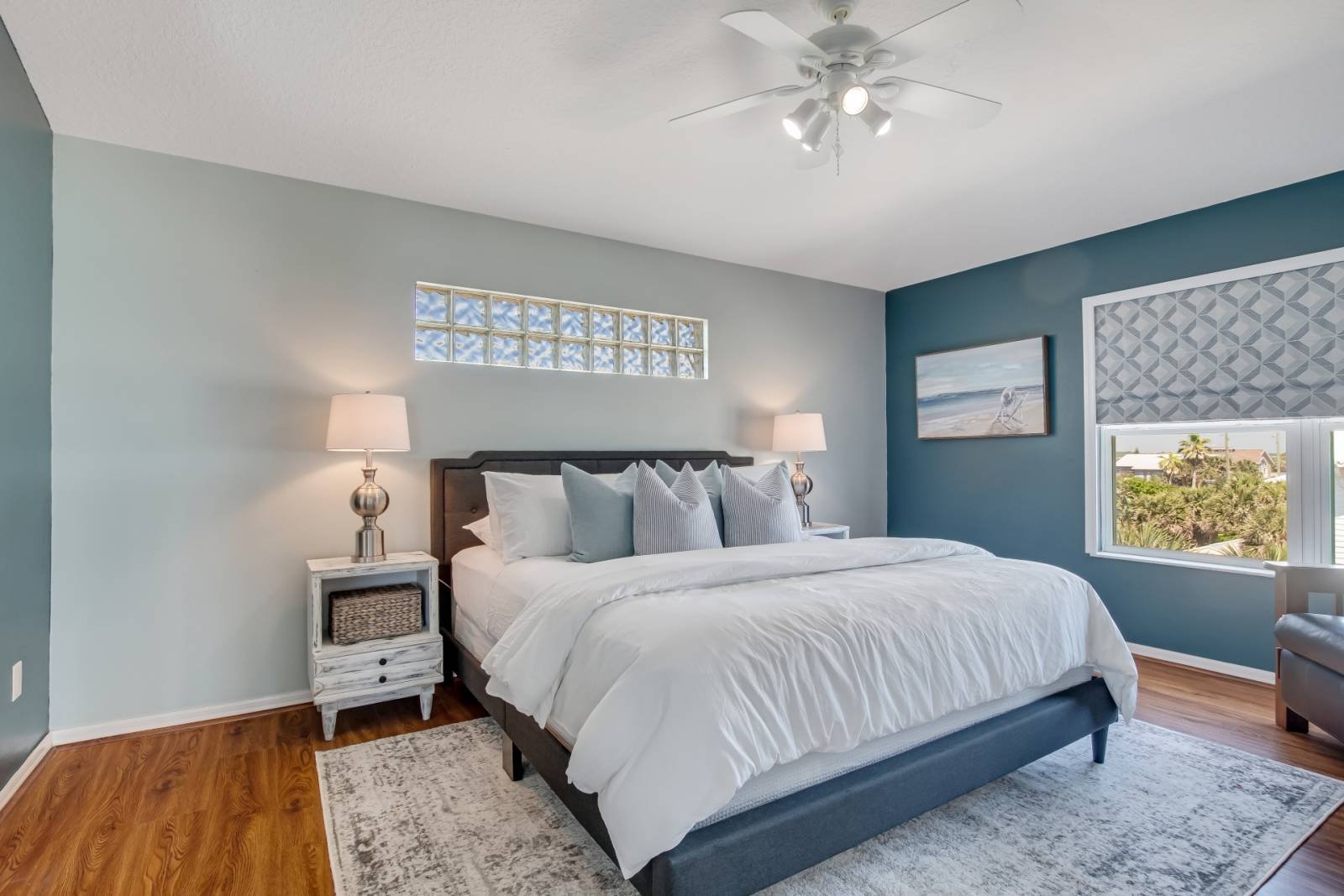 Bedroom with queen bed and side tables